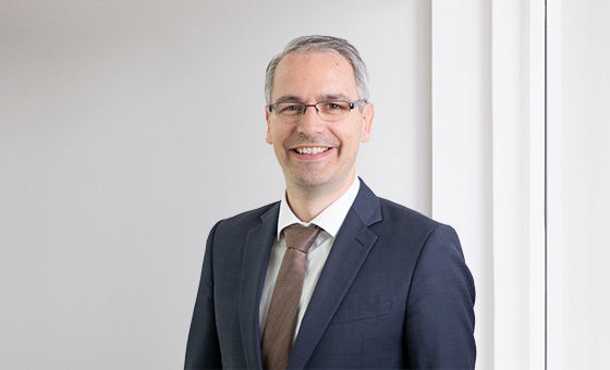 Portraitfoto von Dominique Grosjean, Senior Kundenberater Private Banking bei der St.Galler Kantonalbank
