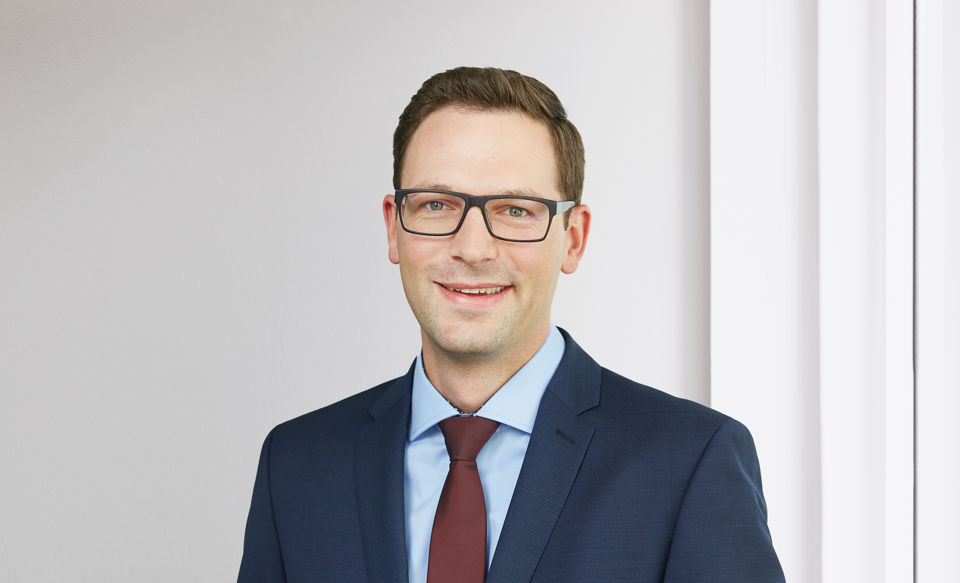 Portraitfoto von Bruno Buchmann, Leiter Gewerbekunden bei der St.Galler Kantonalbank