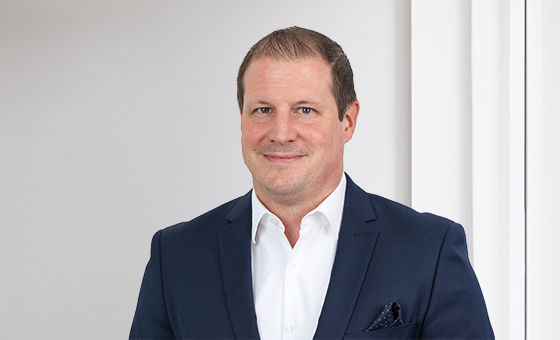 Portraitfoto von Dominik Schmidlin, Leiter Anlagestrategie und Analyse bei der St.Galler Kantonalbank