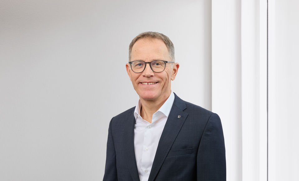 Portraitfoto von Guido Eilinger, Leiter Niederlassung bei der St.Galler Kantonalbank