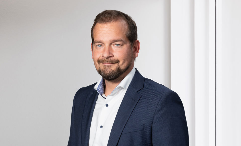 Portraitfoto von Michael Grob, bei der St.Galler Kantonalbank