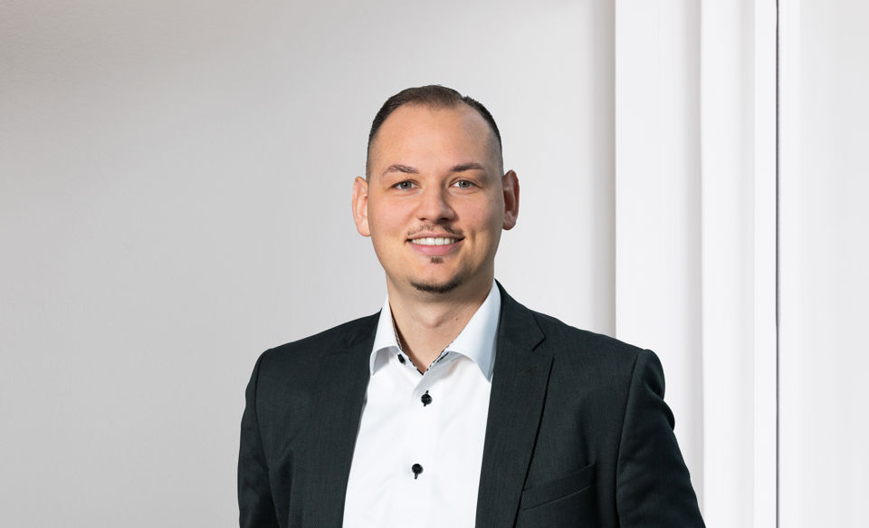Portraitfoto von Andrin Scherrer, Kundenberater Private Banking bei der St.Galler Kantonalbank