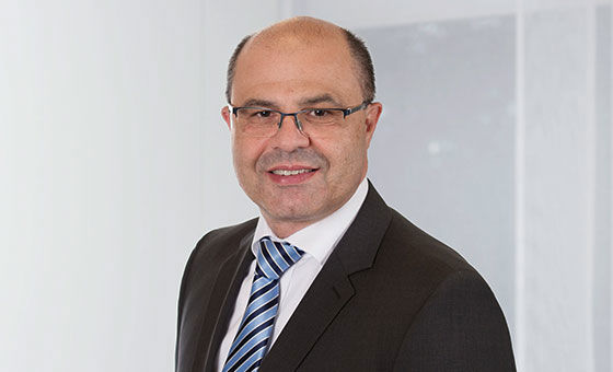 Portraitfoto von Giulio Cifuni, Leiter Gewerbekunden bei der St.Galler Kantonalbank