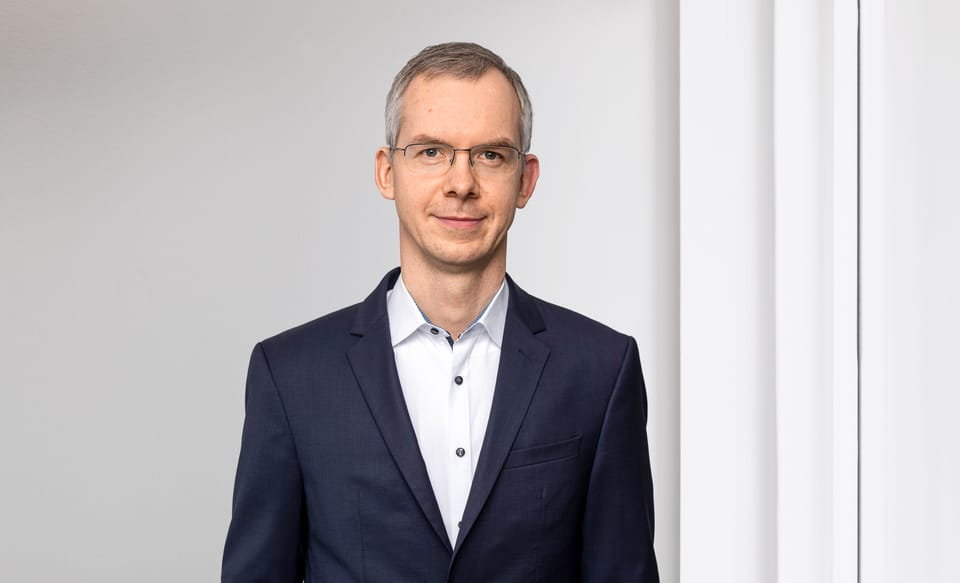Portraitfoto von Falk Kohlmann, Mitglied der Geschäftsleitung und Leiter Marktleistungen der St.Galler Kantonalbank