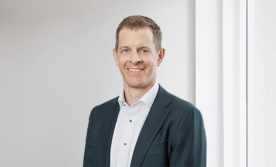 Portraitfoto von Angelo Caviezel, Leiter Private Banking bei der St.Galler Kantonalbank